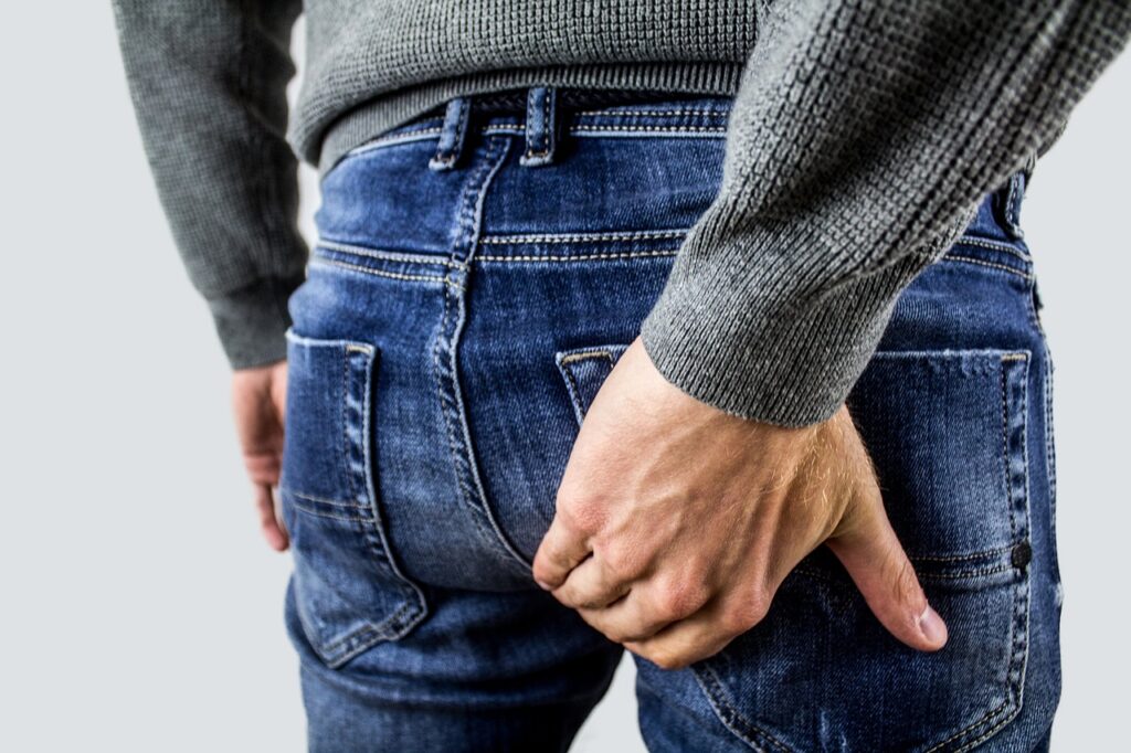 hemorrhoids, proctalgia fugax, prostate, pains, prostatitis, man, po, jeans, hand. best prostate supplement,